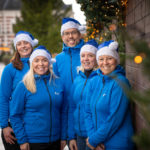 God jul fra ansatte i Blå Kors ferier med blå nisseluer